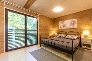 Ένα ή περισσότερα κρεβάτια σε δωμάτιο στο Guesthouse Gavran