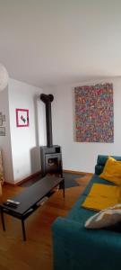 Posezení v ubytování Appartement CHENILLE charmant 2 pièces plein pied avec jardin et vue magnifique