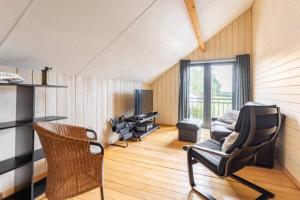 Posezení v ubytování Superbe et chaleureux gîte familial