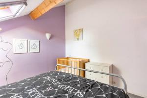 Postel nebo postele na pokoji v ubytování Superbe et chaleureux gîte familial