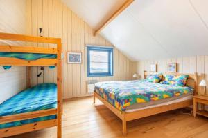 Postel nebo postele na pokoji v ubytování Superbe et chaleureux gîte familial