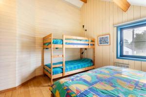 Postel nebo postele na pokoji v ubytování Superbe et chaleureux gîte familial