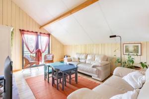 Posezení v ubytování Superbe et chaleureux gîte familial