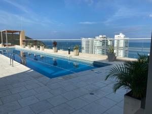 Bazén v ubytování Colibrí Arena - Santa Marta - Aparta Suite 1019 nebo v jeho okolí