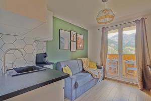 Część wypoczynkowa w obiekcie Studio de charme avec vue sur le Val d'Allos, parking et Wifi gratuit