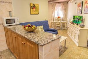 Kuchyň nebo kuchyňský kout v ubytování Apartamentos Casamonteymar