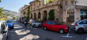 a group of cars parked on the side of a street at Hidden Gem in Mostar