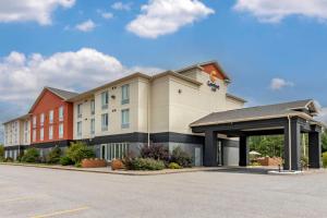 a rendering of a hotel with a parking lot at Comfort Inn in Sturgeon Falls