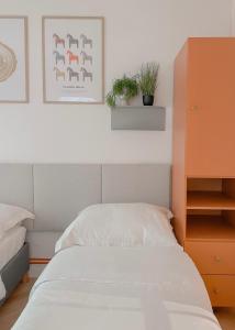 Łóżko lub łóżka w pokoju w obiekcie NØDA - Nørdic Design Apartment with Terrace