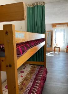 Двуетажно легло или двуетажни легла в стая в Appartement Clos du Bastan avec piscine
