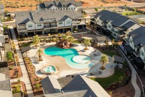 an aerial view of a house with a swimming pool at Kantada in the Sun - Poolside Retreat in Santa Clara