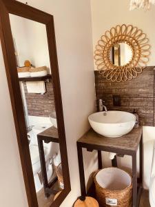 a bathroom with a sink and a mirror at Casa Luce in Puerto Viejo +145 photos