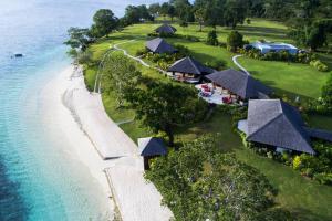 an aerial view of a resort next to the ocean at Private Island Stay in Vitouara
