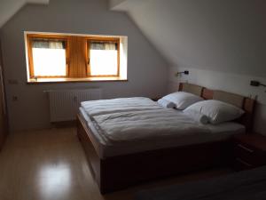 Postelja oz. postelje v sobi nastanitve Apartment HB Moravske Toplice