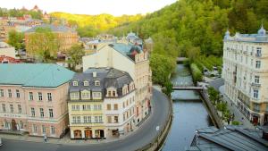 an aerial view of a city with buildings and a river at Sadova luxury apartment in Karlovy Vary