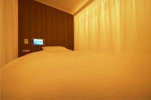 Una cama o camas en una habitación de SLEEPLAB THE STAY 渋谷 -睡眠特化型Hotel-