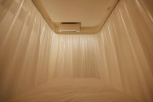 Una cama o camas en una habitación de SLEEPLAB THE STAY 渋谷 -睡眠特化型Hotel-