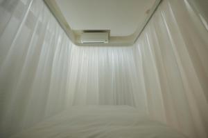 Una cama o camas en una habitación de SLEEPLAB THE STAY 渋谷 -睡眠特化型Hotel-