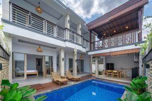 Bazén v ubytování Aditya Villa nebo v jeho okolí