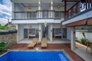 Bazén v ubytování Aditya Villa nebo v jeho okolí