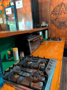 Η κουζίνα ή μικρή κουζίνα στο Kin Hostal and Camping