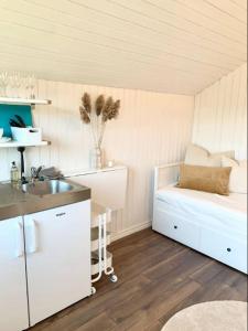 Postel nebo postele na pokoji v ubytování SeaSide