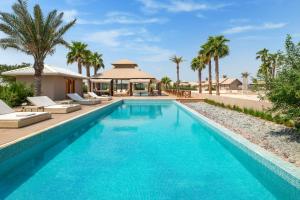 Πισίνα στο ή κοντά στο The Outpost Al Barari Camp