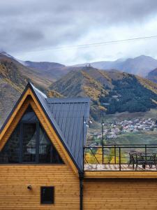 a house with a view of a mountain at Magic Hut_Kazbegi in Kazbegi