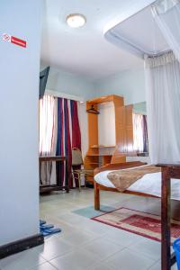 Postel nebo postele na pokoji v ubytování Jupiter Guest House - Parklands
