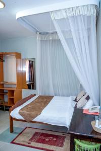 Postel nebo postele na pokoji v ubytování Jupiter Guest House - Parklands