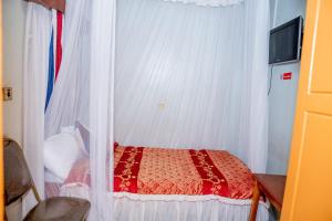 Postel nebo postele na pokoji v ubytování Jupiter Guest House - Parklands