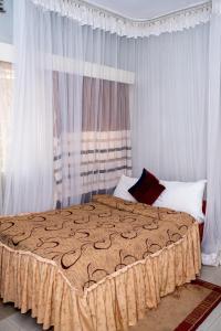 Postel nebo postele na pokoji v ubytování Jupiter Guest House - Parklands
