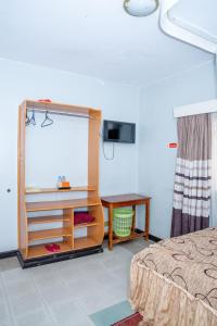 Postel nebo postele na pokoji v ubytování Jupiter Guest House - Parklands