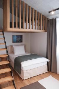 Postel nebo postele na pokoji v ubytování Casa Flurina