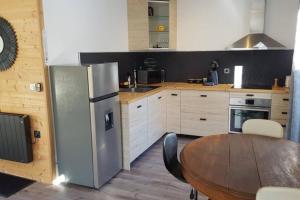 Kuchyň nebo kuchyňský kout v ubytování Logement entier: appartement.