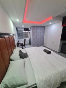 Letto o letti in una camera di ULOM CONDOS