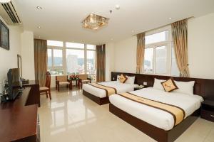 Μια τηλεόραση ή/και κέντρο ψυχαγωγίας στο Sunview Beach Hotel Danang