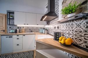 Kuchyň nebo kuchyňský kout v ubytování Apartmánový dům Jeník