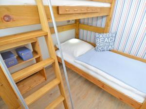 Postel nebo postele na pokoji v ubytování Haus Mönchgut - Haushälfte 1 "Feuerstein"