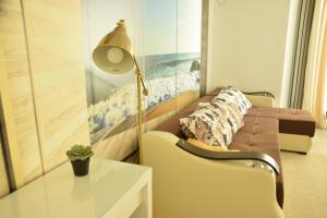 Et opholdsområde på Apartament Willow by the Sea by Alz