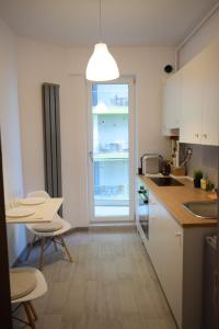 Køkken eller tekøkken på Apartament Willow by the Sea by Alz