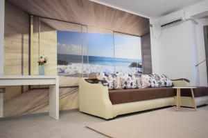 En eller flere senge i et værelse på Apartament Willow by the Sea by Alz