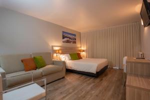 Llit o llits en una habitació de Hotel Del Pui