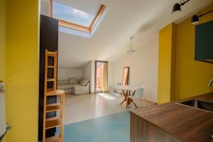 Posezení v ubytování La Scivola Rooms