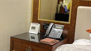 Postel nebo postele na pokoji v ubytování Bayat Hotel