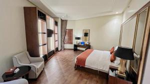 Postel nebo postele na pokoji v ubytování Bayat Hotel