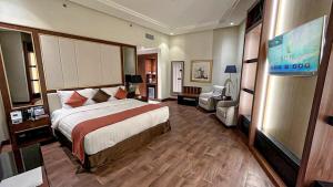 Postel nebo postele na pokoji v ubytování Bayat Hotel