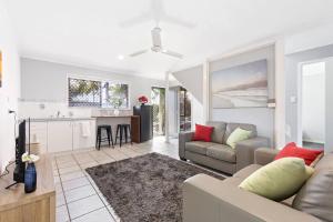 A seating area at Torquay Beach Splendour - An Expansive Family Stay