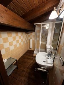 a bathroom with a sink and a shower at Chalet Edelweiss - Estella Hotel Collection in Sestriere