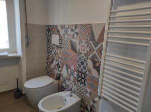 Un baño de Alloggio turistico da Elide 12 fotos más